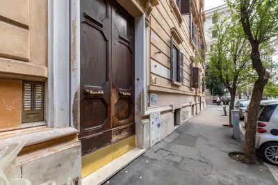 a door to a building on a city street at Saint Peter Caesar Suites in Rome