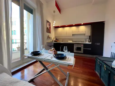 a kitchen with a table with two bowls on it at Interno 4 in Rome - Aventino e Circo Massimo in Rome