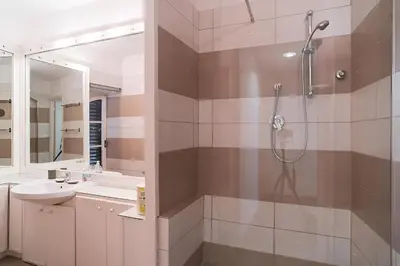a bathroom with a shower and a sink at Trevi's BuddyRent in Rome