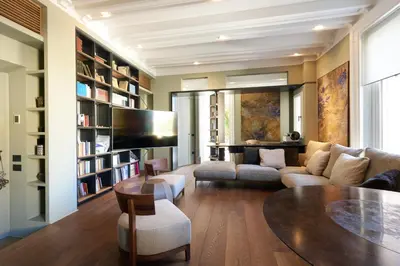 a living room with a couch and a table at Casa MastroiannI con Terrazzo in Rome