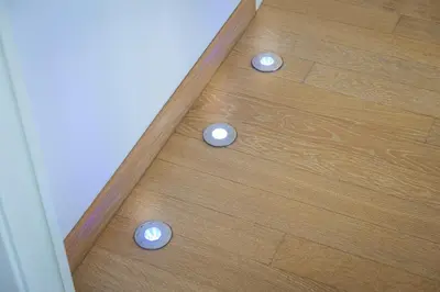 a wooden floor with three buttons on it at Piramide view by Rental in Rome in Rome