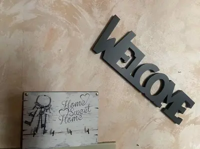 a drawing of a skeleton next to a sign at Allegra’s House Barberini in Rome