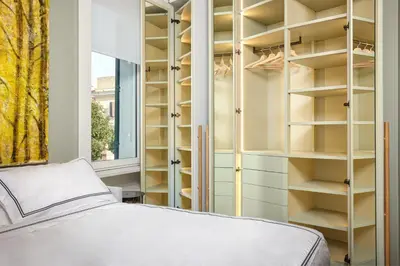 a bedroom with a bed and a window at Casa Loren con Terrazzo in Rome