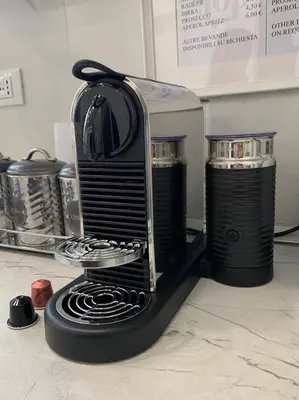 a coffee maker sitting on a kitchen counter at 6 AL TOP in Rome