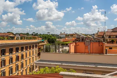 a view of the city from the roof of a building at iFlat Magical flat by the Tiber in Rome