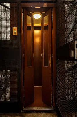 an open door with a light on top of it at Scipioni Luxury Suite (3 camere, 3 bagni) in Rome