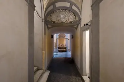 a hallway with an archway with a ceiling at iFlat Pantheon 's Gem in Rome