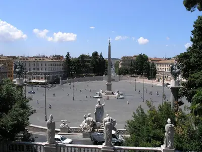 a large plaza with statues in the middle of a city at Charming Apartment Piazza del Popolo in Rome