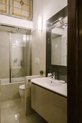 a bathroom with a sink and a toilet at Appartamento Roma Vaticano 