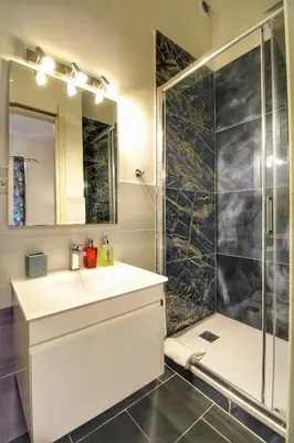 a bathroom with a sink and a shower at Gio' Suites in Rome