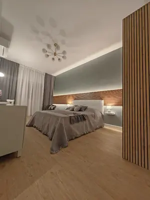 a bedroom with a bed and a ceiling at Domus Aldini in Rome