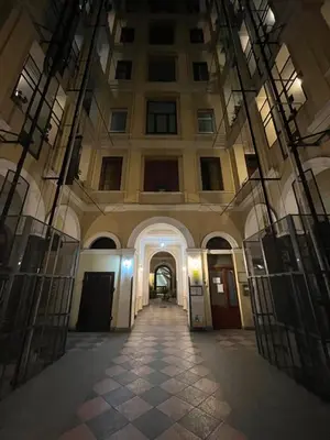 an empty hallway in a building with a large building at Appartamento Minimal Roma centro in Rome