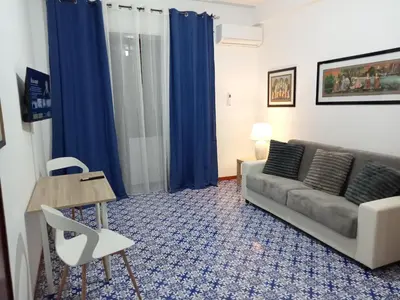 a living room with a couch and a table at House Vaticano in Rome