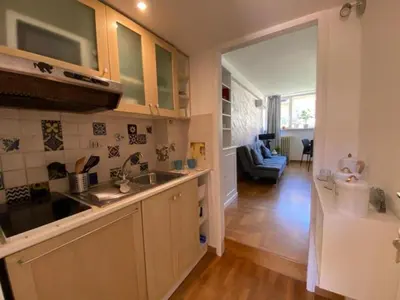 a kitchen with a sink and a counter top at Margutta Domitia Home in Rome