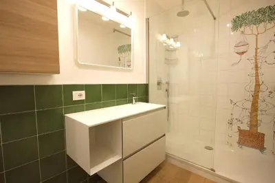 a bathroom with a sink and a shower at Magnolia House in Testaccio in Rome