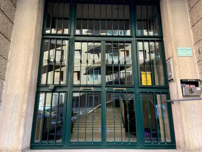 a large glass door to a building at Mate's Apartment in Rome
