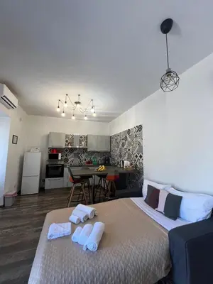 a bedroom with a bed with towels on it at Casa Bravetta - Parking Private in Rome