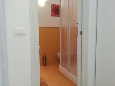 a bathroom with a shower and a toilet at Between Termini & Colosseo in Rome