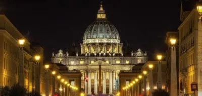 a large building with a domed building with street lights at B&B Rome Downtown Deluxe in Rome