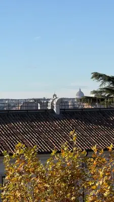 a group of empty seats in a baseball stadium at Maison Merulana Colosseo in Rome
