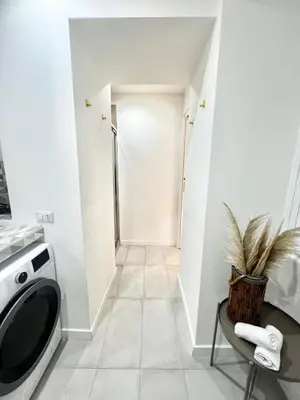 a laundry room with a washer and dryer at Saint Peter 78 - Design Apartment in Rome