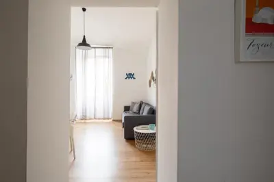 a living room with a couch and a table at Casa Filiberto in Rome