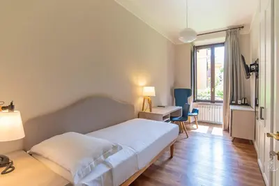 a hotel room with a bed and a window at HOTEL DELLE CIVETTE in Rome