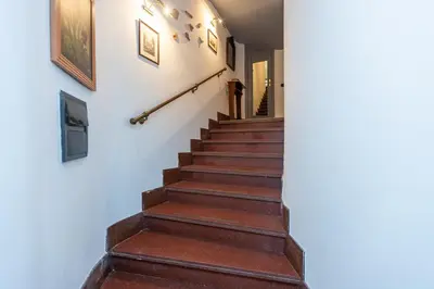 a staircase in a house with wooden steps at Pantheon by Rental in Rome in Rome