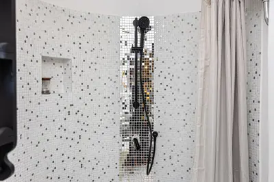 a shower in a wall with a shower curtain at Pantheon by Rental in Rome in Rome