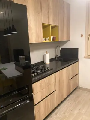 a kitchen with a sink and a stove top oven at 8380 Lory's House in Rome
