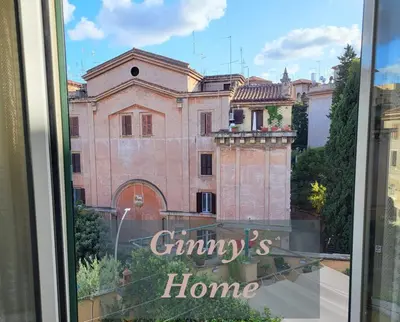 a view of a building from the window of a house at Ginny's Home in Rome