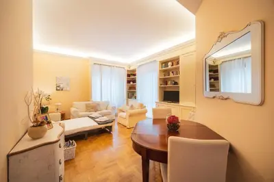 a room with wooden stairs and a closet at St. Peter Hill BuddyRent in Rome