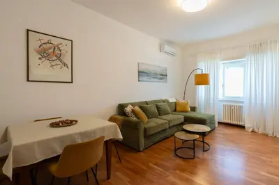a living room with a couch and a table at Kimera Luxury Apartments in Rome San Pietro in Rome