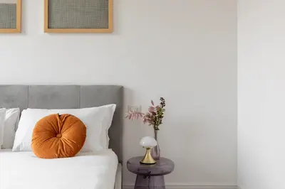 a bedroom with a bed with a pillow on it at iFlat Magnificent Central Apartment in Rome