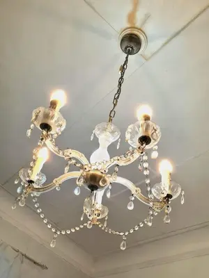 a chandelier hanging from a ceiling at Gorgeous Flat In Pigneto in Rome