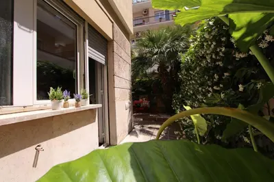 a window of a building with potted plants on it at S. Peter 2 - Apartment with garden -50m from metro in Rome