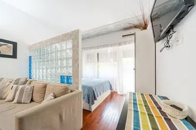 a living room with a couch and a bed at St. Peter - Loft at 50m from Metro (up to 4) in Rome