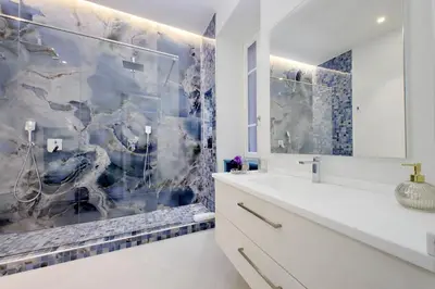 a bathroom with a sink and a shower at A 2 passi da Piazza di Spagna in Rome