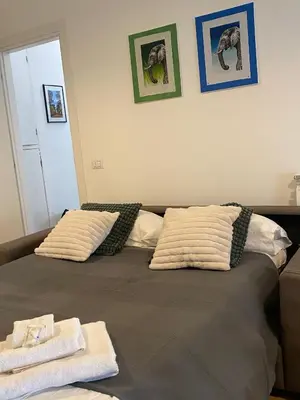 two pillows on top of a bed in a room at Casa Arcangela by GHOR in Rome