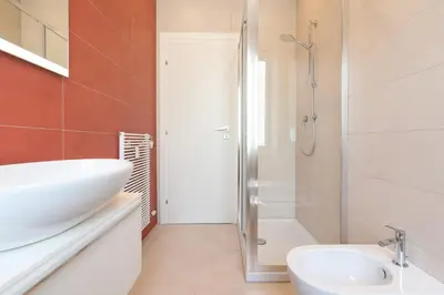 a bathroom with a sink and a shower at [15 minutes from the centre] Free Wi-Fi & A/C in Rome