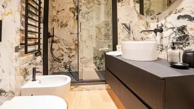 a bathroom with a sink and a shower at Pinciana - Veneto - Marilyn House in Rome