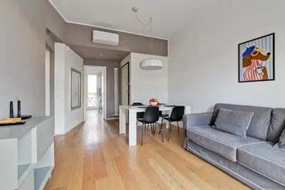 a living room with a couch and a table at Design Monteverde Flat in Rome