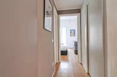 a hallway with a door leading to a bedroom at Design Monteverde Flat in Rome