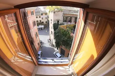 an open window with a view of a street at Nesty Margana House in Rome