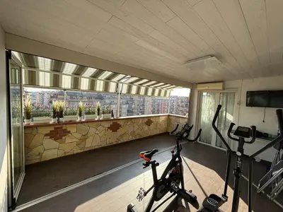 a room with a gym with a view of a city at LUXURY AV in Rome