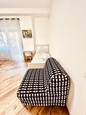 a bedroom with a bed in a room at 15 Min. Colosseo 1 - Casa di Giò in Rome