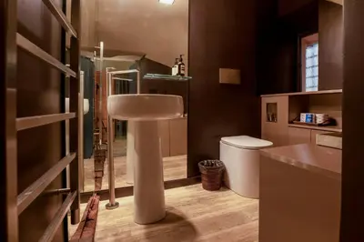 a bathroom with a sink and a toilet at CadensPlace - Overlooking Piazza Navona by dbalconycollection in Rome