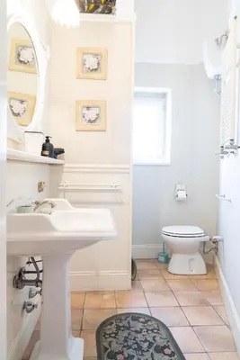 a bathroom with a sink and a toilet at Casa di Amici alla Garbatella in Rome