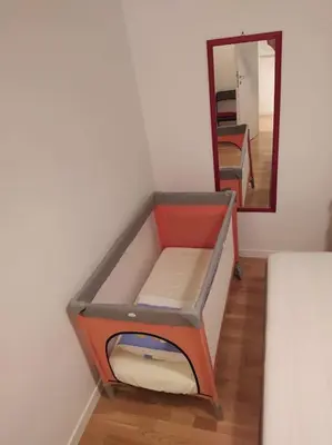 a bunk bed in a room with a mirror at La Casetta di Monteverde in Rome