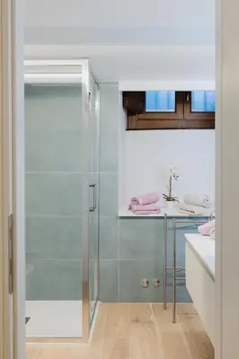 a bathroom with a shower and a sink at Modern loft in central Rome in Rome